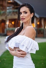 Ukrainian mail order bride Yana from Kyiv with brunette hair and brown eye color - image 12