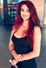 Ukrainian mail order bride Vladislava from Kyiv Oblast with red hair and green eye color - image 3