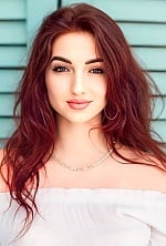Ukrainian mail order bride Vladislava from Kyiv Oblast with red hair and green eye color - image 4