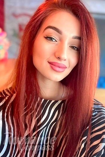 Ukrainian mail order bride Vladislava from Kyiv Oblast with red hair and green eye color - image 1