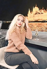 Ukrainian mail order bride Oksana from Talne with blonde hair and green eye color - image 4
