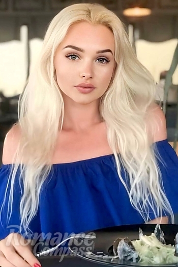 Ukrainian mail order bride Oksana from Talne with blonde hair and green eye color - image 1