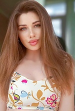 Ukrainian mail order bride Alina from Rivne with light brown hair and green eye color - image 36