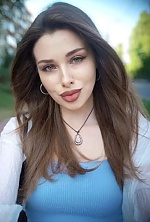 Ukrainian mail order bride Alina from Rivne with light brown hair and green eye color - image 23