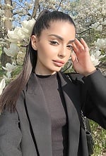 Ukrainian mail order bride Lilit from Kyiv with black hair and brown eye color - image 5