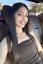 Ukrainian mail order bride Lilit from Kyiv with black hair and brown eye color - image 6