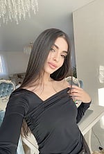 Ukrainian mail order bride Lilit from Kyiv with black hair and brown eye color - image 7