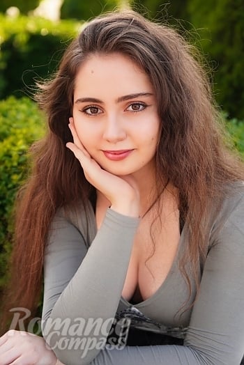 Ukrainian mail order bride Daria from Kyiv with light brown hair and brown eye color - image 1
