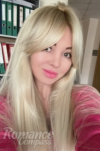 Ukrainian mail order bride Tatiana from Ivano-Frankivsk with blonde hair and green eye color - image 1