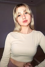 Ukrainian mail order bride Bogdana from Kyiv with blonde hair and blue eye color - image 7