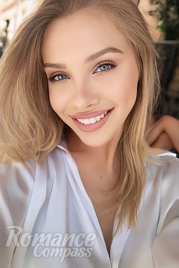 Ukrainian mail order bride Veronika from Kyiv with blonde hair and blue eye color - image 1