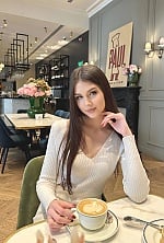 Ukrainian mail order bride Karyna from Kyiv with light brown hair and hazel eye color - image 9