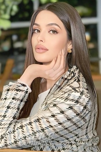 Ukrainian mail order bride Olga from Kyiv with light brown hair and hazel eye color - image 1