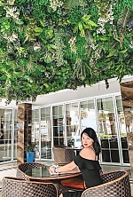 Ukrainian mail order bride Olena from M&uuml;nchen with black hair and green eye color - image 34