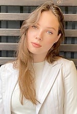 Ukrainian mail order bride Sofia from Chernihiv with light brown hair and blue eye color - image 8