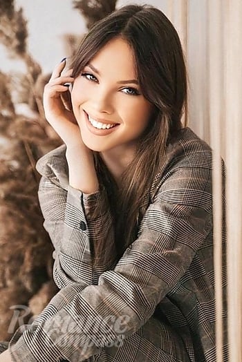 Ukrainian mail order bride Sofia from Chernihiv with light brown hair and blue eye color - image 1