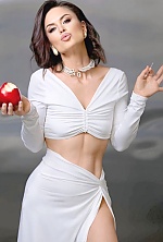 Ukrainian mail order bride Diana from Ivano-Frankivsk with black hair and green eye color - image 9