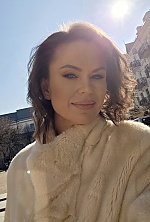 Ukrainian mail order bride Diana from Ivano-Frankivsk with black hair and green eye color - image 13