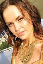 Ukrainian mail order bride Diana from Ivano-Frankivsk with black hair and green eye color - image 16