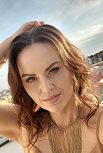 Ukrainian mail order bride Diana from Ivano-Frankivsk with black hair and green eye color - image 11