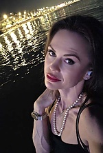 Ukrainian mail order bride Diana from Ivano-Frankivsk with black hair and green eye color - image 28