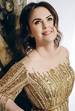 Ukrainian mail order bride Diana from Ivano-Frankivsk with black hair and green eye color - image 12