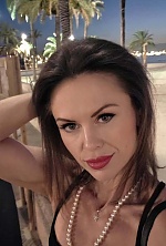 Ukrainian mail order bride Diana from Ivano-Frankivsk with black hair and green eye color - image 27