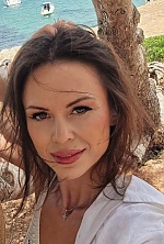 Ukrainian mail order bride Diana from Ivano-Frankivsk with black hair and green eye color - image 33