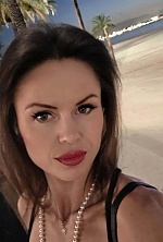 Ukrainian mail order bride Diana from Ivano-Frankivsk with black hair and green eye color - image 30