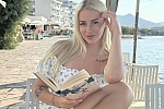 Ukrainian mail order bride Myroslava from Warsaw with blonde hair and blue eye color - image 9
