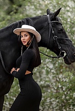 Ukrainian mail order bride Viktoriia from Warsaw with black hair and brown eye color - image 10
