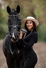 Ukrainian mail order bride Viktoriia from Warsaw with black hair and brown eye color - image 12