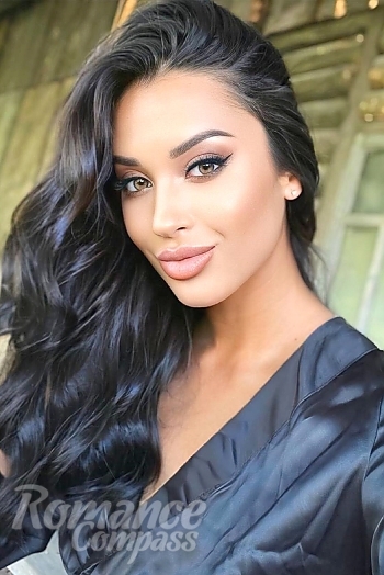 Ukrainian mail order bride Viktoriia from Warsaw with black hair and brown eye color - image 1