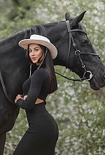 Ukrainian mail order bride Viktoriia from Warsaw with black hair and brown eye color - image 11
