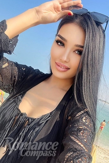 Ukrainian mail order bride Nursulu from Almaty with brunette hair and brown eye color - image 1