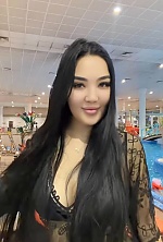 Ukrainian mail order bride Nursulu from Almaty with brunette hair and brown eye color - image 33