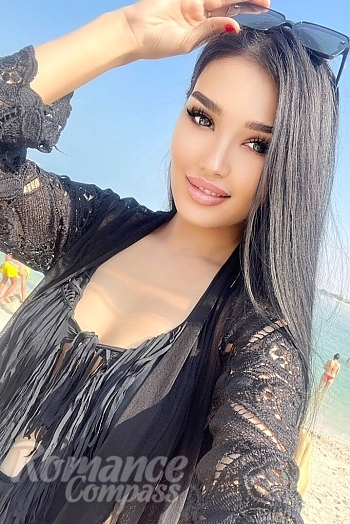 Ukrainian mail order bride Nursulu from Almaty with brunette hair and brown eye color - image 1