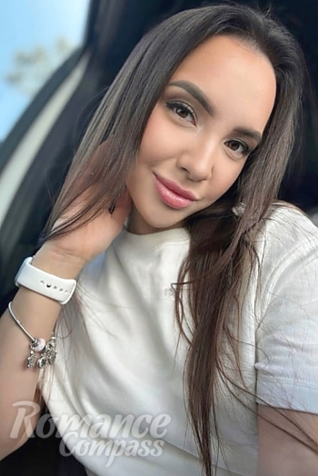 Ukrainian mail order bride Diana from Dnipro with brunette hair and hazel eye color - image 1
