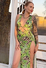 Ukrainian mail order bride Yana from Ivano-Frankivsk with black hair and green eye color - image 2