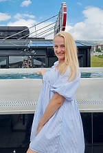 Ukrainian mail order bride Ilona from Paris with blonde hair and blue eye color - image 10