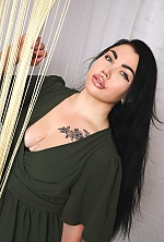 Ukrainian mail order bride Oksana from Mykolayiv with black hair and blue eye color - image 21