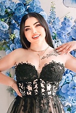 Ukrainian mail order bride Oksana from Mykolayiv with black hair and blue eye color - image 7