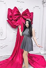 Ukrainian mail order bride Oksana from Mykolayiv with black hair and blue eye color - image 5
