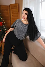 Ukrainian mail order bride Oksana from Mykolayiv with black hair and blue eye color - image 9