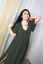 Ukrainian mail order bride Oksana from Mykolayiv with black hair and blue eye color - image 20