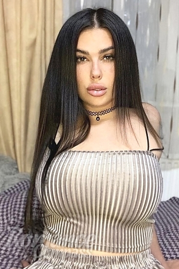 Ukrainian mail order bride Alina from Kyiv with black hair and green eye color - image 1
