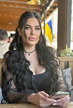 Ukrainian mail order bride Alina from Kyiv with black hair and green eye color - image 8