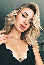 Ukrainian mail order bride Liubov from Katowice with blonde hair and blue eye color - image 9