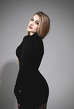 Ukrainian mail order bride Anastasiia from Warsaw with light brown hair and blue eye color - image 9