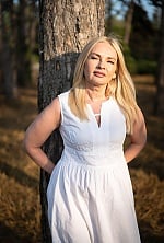 Ukrainian mail order bride Tatiana from Bucharest with blonde hair and blue eye color - image 11